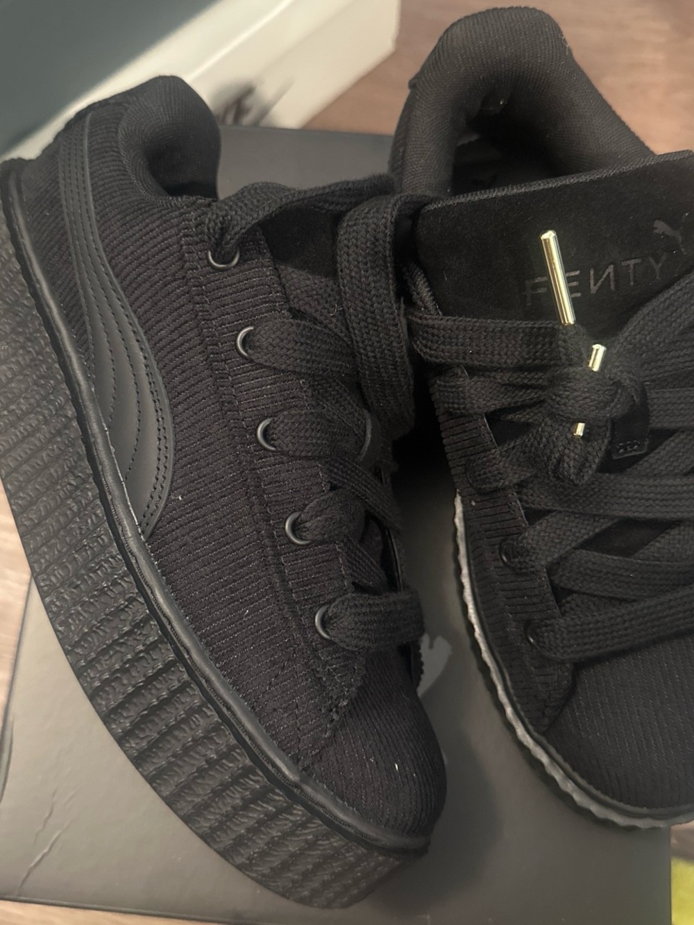 Puma Black Corduroy Platform Sneakers with Gold Lace Tips